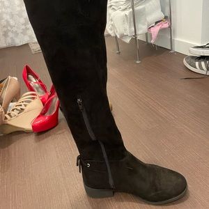 black flat over the knee boot